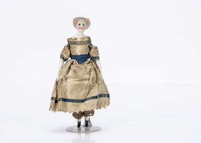 Lot 733 - A German bisque shoulder-head dolls’ house doll