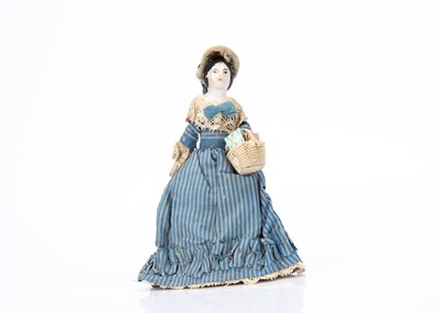 Lot 735 - An 19th century German china shoulder-head dolls’ house doll