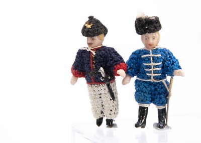 Lot 744 - Two miniature Horn all-bisque soldier dolls