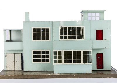 Lot 754 - A large Tri-ang wooden Ultra Modern dolls’ house No.53