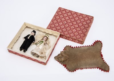 Lot 757 - A 1930s all-bisque dolls’ house bride and groom doll