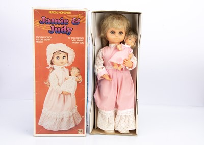 Lot 770 - A Polytoy vinyle Jamie & Judy clockwork doll