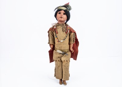 Lot 782 - An Armand Marseille Running Bear Native American Indian doll