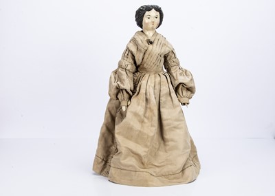 Lot 803 - A German carved wooden shoulder-head doll