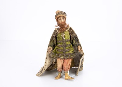 Lot 809 - An unusual 19th century Continental wax headed creche figure