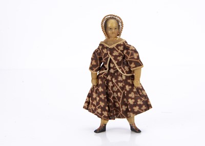 Lot 813 - A rare mid 19th century poured wax dolls’ house child doll