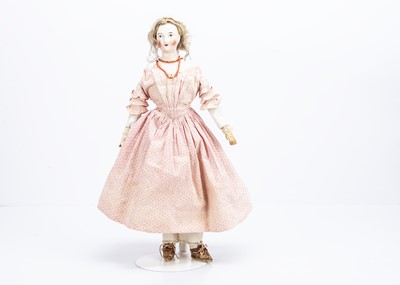 Lot 823 - A fine 19th century German pink tinted wigged shoulder-head lady doll