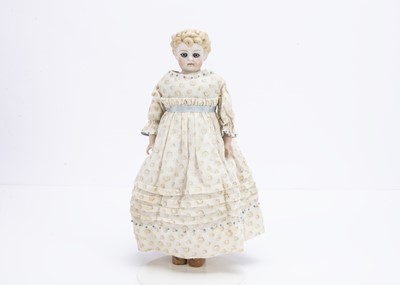 Lot 831 - A German bisque shoulder-head doll with glass eyes