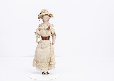 Lot 836 - A small German wigged bisque shoulder-head doll