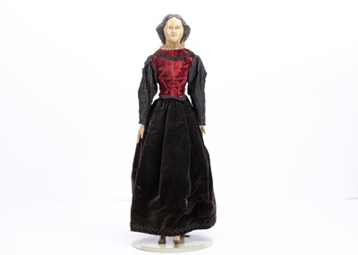 Lot 840 - A 19th century papier-mâché shoulder-head lady doll