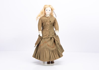 Lot 847 - A rare Simon & Halbig swivel head fashionable doll with twill covered articulated body 1870s