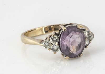 Lot 297 - A 9ct gold amethyst and diamond dress ring
