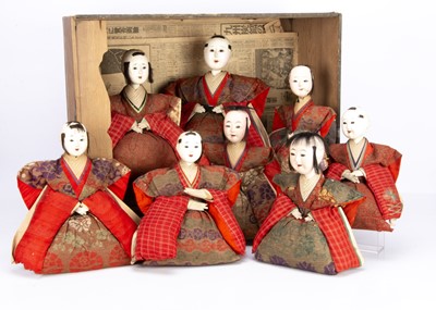 Lot 875 - An unusual set of eight Japanese Ningyo gufon seated male dolls in original wooden box