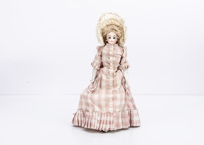 Lot 885 - A small French shoulder-head fashionable doll