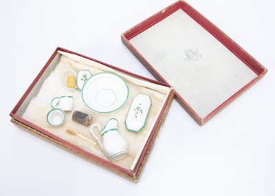 Lot 892 - A French porcelain doll’s wash set