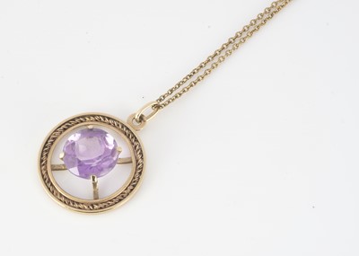 Lot 299 - A 9ct gold amethyst openwork drop pendant and chain