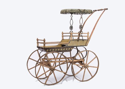 Lot 901 - A lat 19th century American doll’s buggy perambulator