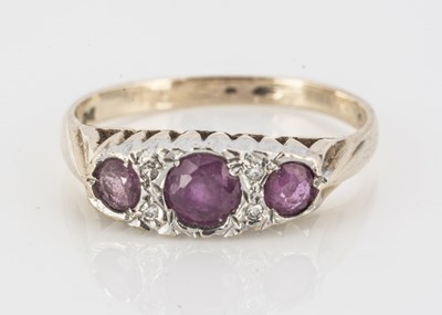 Lot 30 - A 9ct gold ruby and diamond dress ring
