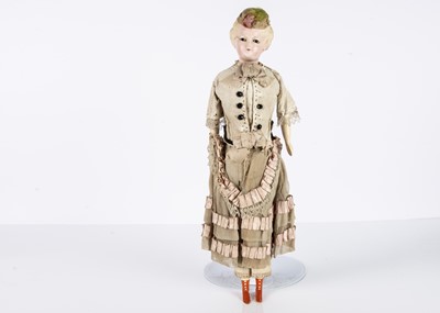 Lot 927 - A 19th century German wax over composition lady doll with moulded hat