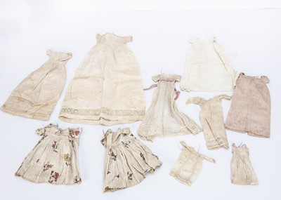 Lot 930 - A selection of early 19th century doll’s clothing