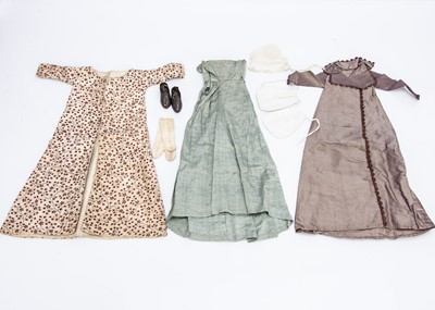 Lot 933 - A rare group of early 19th century doll’s clothing