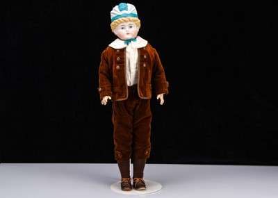 Lot 943 - A rare large Alt, Beck & Gottschalk bisque shoulder head boy doll with moulded hat