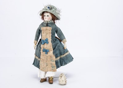 Lot 955 - A small French pressed bisque swivel head fashionable doll