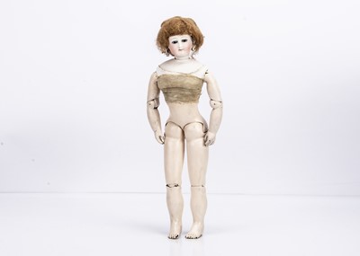 Lot 956 - A French pressed bisque swivel head fashionable doll with rare jointed air-blown leather body