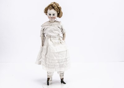 Lot 965 - A German swivel-head fashionable doll