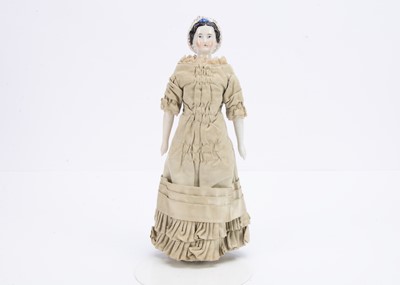 Lot 966 - A small German shoulder-head doll known as The Grape Lady