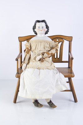 Lot 970 - A 19th century German china shoulder head doll