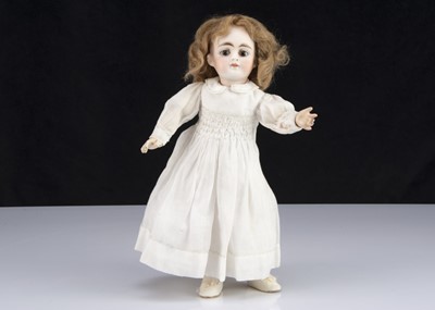 Lot 971 - An early F & W Goebel bisque headed closed mouth doll