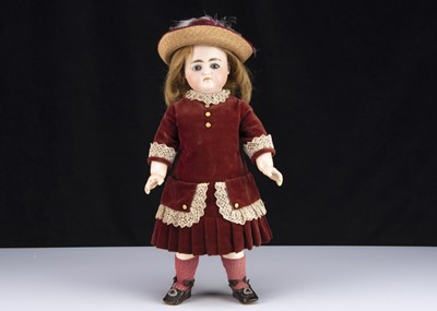 Lot 972 - A late 19th century Simon & Halbig 989 closed mouth child doll