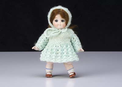 Lot 977 - A small Kestner all-bisque 111 googly eyed doll