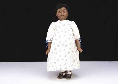 Lot 980 - An unusual English bisque black shoulder-head doll