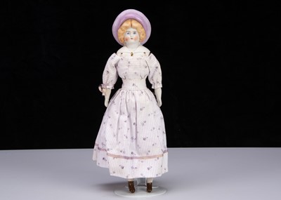 Lot 984 - A Hertwig bisque shoulder-head doll in moulded Sou’wester hat