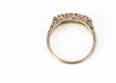Lot 306 - A five stone diamond dress ring