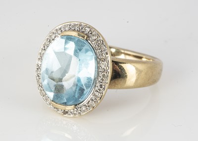 Lot 314 - A 9ct topaz and diamond dress ring