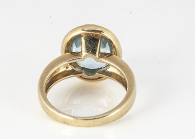 Lot 314 - A 9ct topaz and diamond dress ring