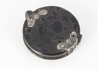 Lot 319 - A 19th century tortoiseshell and white metal lens