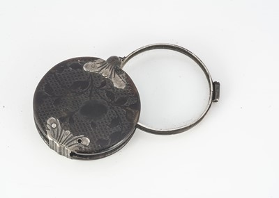 Lot 319 - A 19th century tortoiseshell and white metal lens