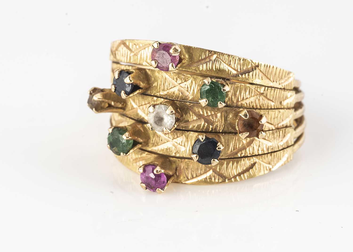 Lot 360 - A high carat gold and multi gem set 'Middle Eastern' style dress ring