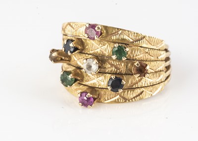 Lot 360 - A high carat gold and multi gem set 'Middle Eastern' style dress ring