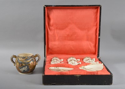 Lot 111 - A boxed set of 20th century Japanese satsuma ware cups and saucers
