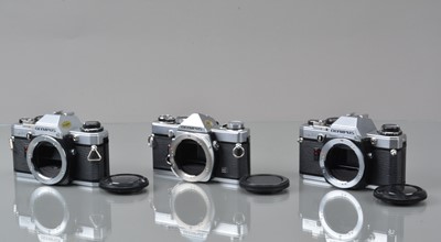 Lot 110 - Three Olympus SLR Camera Bodies.