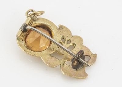 Lot 37 - A 19th Century yellow metal (untested) imperial topaz flower and hand brooch