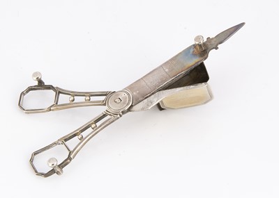 Lot 456 - A pair of George III silver candle snuffer scissors