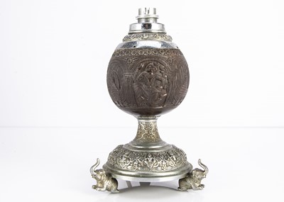 Lot 476 - A c1930s Indian carved coconut and silver plated table lamp