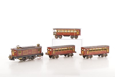 Lot 429 - Ives / Lionel 0 Gauge Locomotive and coaches consisting of Ives 0-4-0 Overhead electric style Locomotive