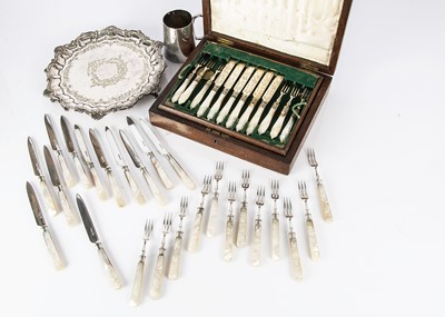 Lot 488 - A set of twelve Victorian silver and mother of pearl handled dessert knives and forks